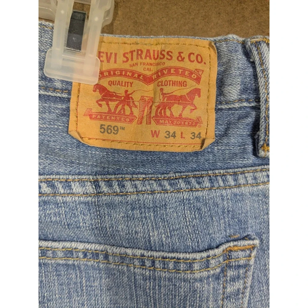 Levi's 569 Loose Straight Leg Jeans Mens 34x34 Light Wash Blue Denim 569-0127